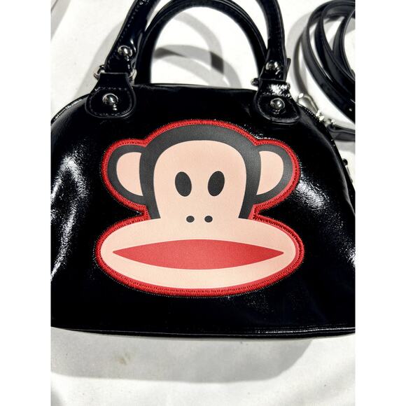Paul Frank Handbags - NWOT Paul Frank Patent Leather handbag with a crossbody strap